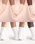 Collage of Piggy's blush and white socks shown on different skin tones.