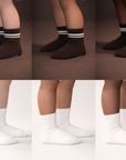 Collage of Piggy's espresso brown and white socks shown on different skin tones.