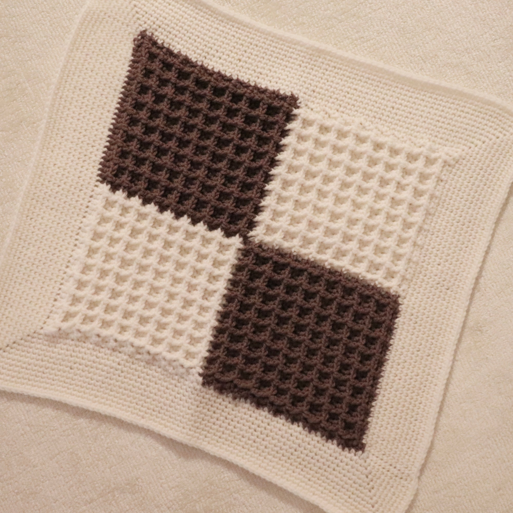 merino wool checkered waffle knit baby lovey blanket in espresso brown and bone