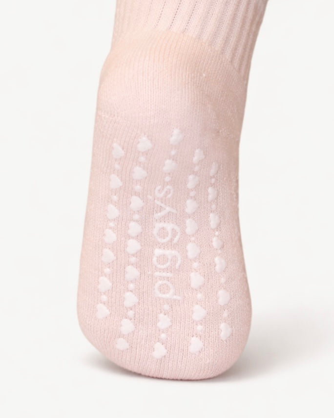 Single Piggy's baby sock in blush suede with white heart grip pattern