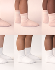 Collage of Piggy's blush and white socks shown on different skin tones.